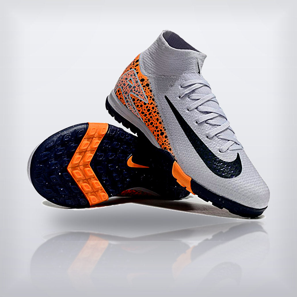Tachos Jr. Mercurial Superfly 10 TF Safari Naranja — X Cleats MX